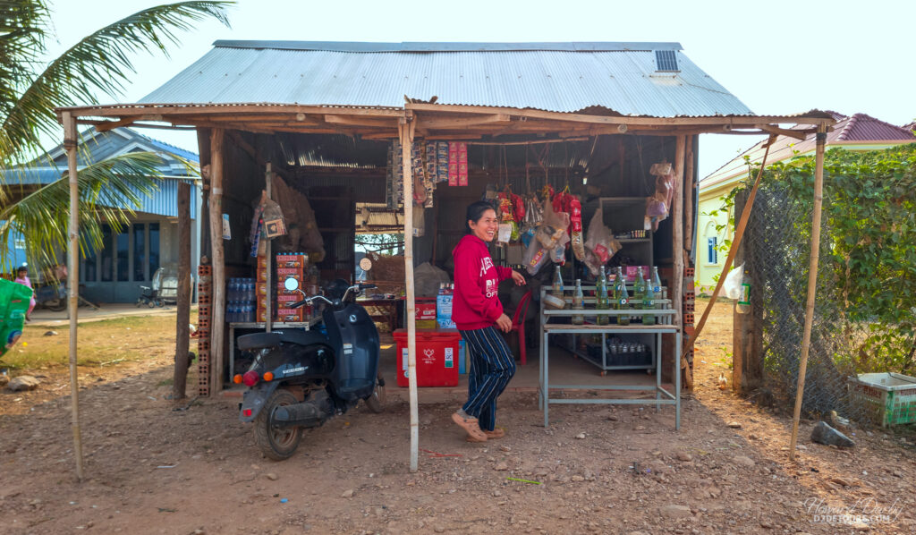 While touring the countryside our driver announced he needed to fill up, so pulled over to a roadside shack that acts as a local filling station (notice the bottles of gas on the rack)