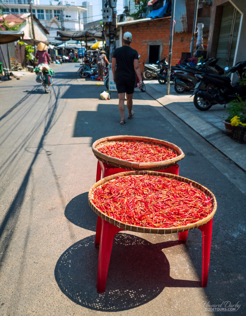 A shop drying peppers on a backstreet