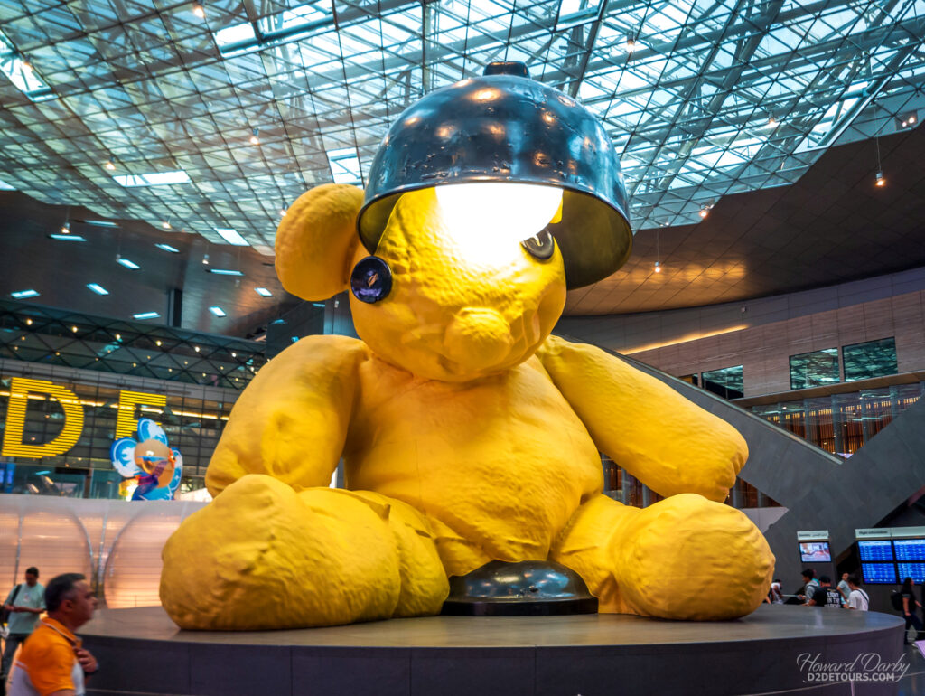 Giant teddy bear in the terminal