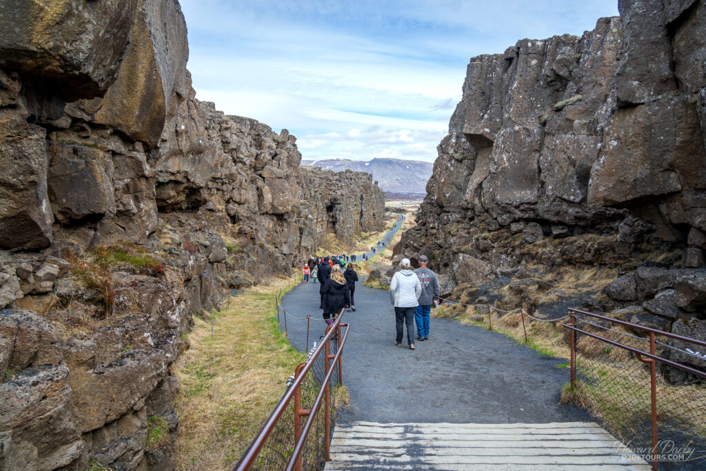 Whitney (in white jacket) walking with our travel buddies from Georgia through the rift valley of Þingvellir National Park