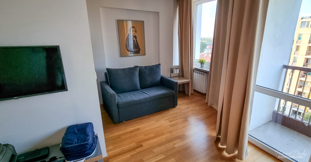 A weird setup in our Warsaw Airbnb - the couch was in the kitchen nook, out of sight of the TV