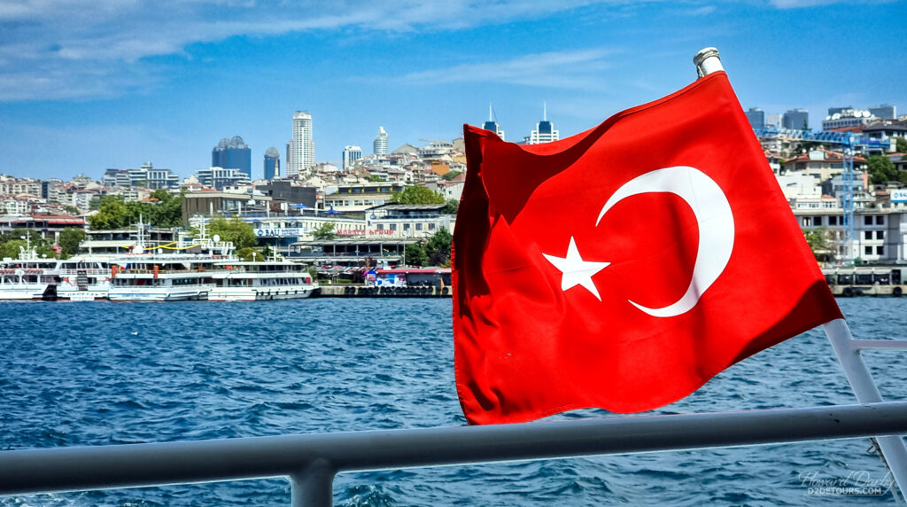 Turkish flag on the back of a ferry across the Bosphorus - the cannel separating the European and Asian sides of Istanbul