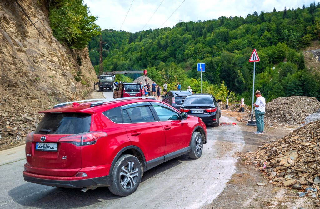 We navigated through a number of spots where half the harrow road had fallen down the cliff, but this was the only one where there was a roadcrew on site. The green crane truck blocked the one remaining lane on the left for about 30 minutes while they lowered equipment to the crew down the cliff.