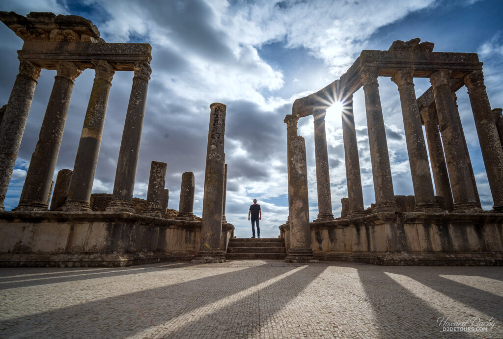 Howard at the Entering the Roman Theatre of Dougga