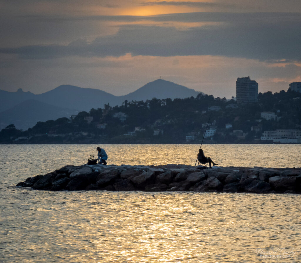 Fishermen at sunset in Juan-Les-Pin