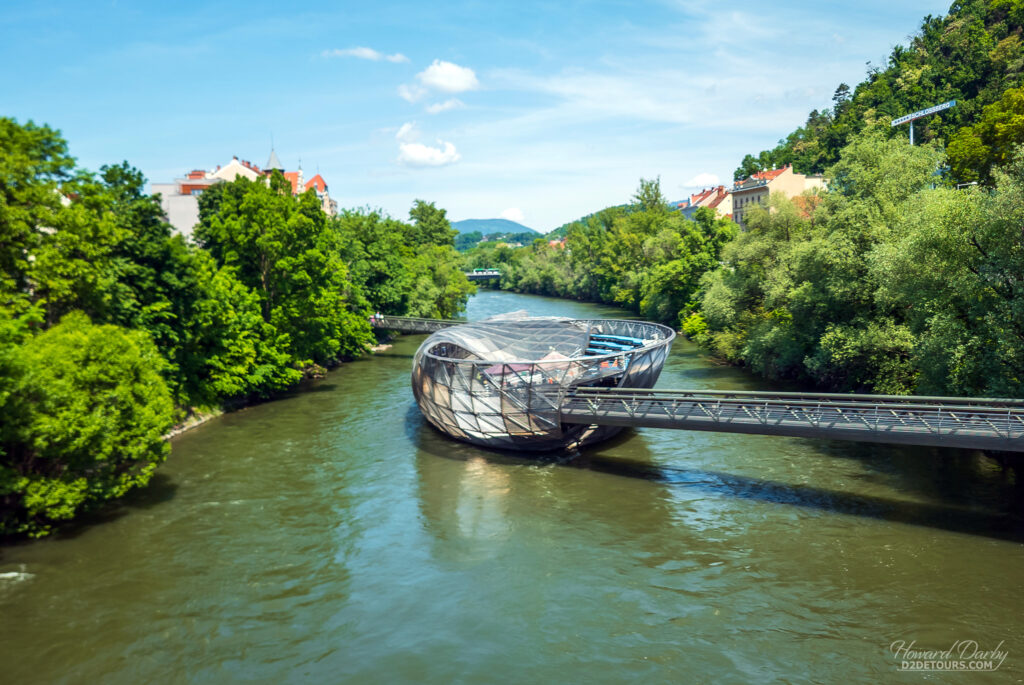 A cafe and theatre in the middle of the Mur River in Graz